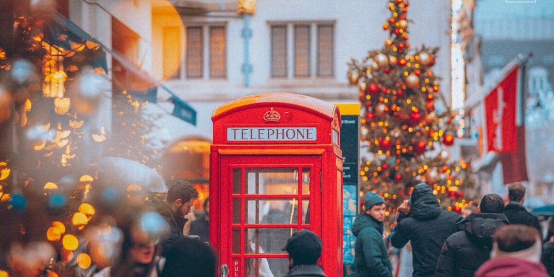 Red Telephone Booth in London Streets during London Christmas Lights